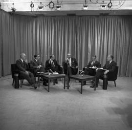 Photograph of a panel of six unidentified people