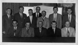 Photograph of twelve men in suits