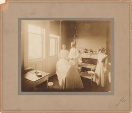 Photograph of Dr. Robert Faulkner O'Brien performing a medical procedure