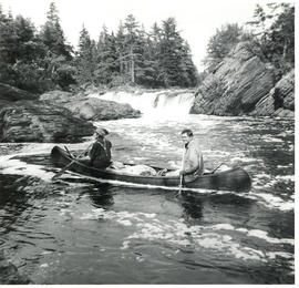 Photograph of "Indian Johnnie" (Eric Clavering) and "Neil" (James Doohan) canoeing on the Sheet H...