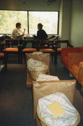 Photograph of four gift hampers for a group baby shower held in the staff room of the Killam Memo...