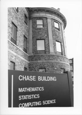 Photograph of a sign in front of the Chase Building