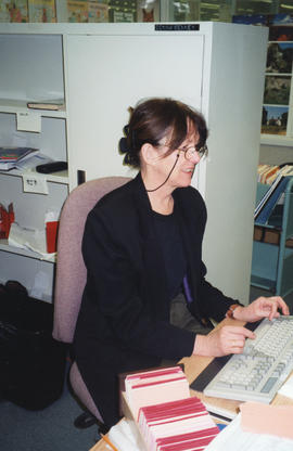 Photograph of Donna Kenney in the Cataloguing Department of the Killam LIbrary