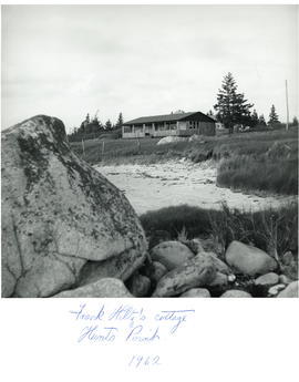 Photograph of Frank Hiltz's cottage taken from the beach at Hunts Point