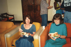 Photograph of Donna Kenney and Carol Richardson at a baby shower held in the staff room on the 5t...