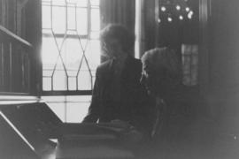Photograph of Karen Smith and an unidentified man in the Kipling room at the former MacDonald Lib...