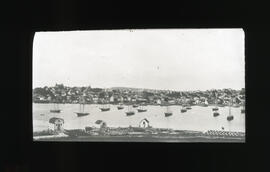 Photograph of ships in an unidentified harbour