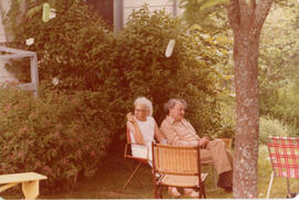 Photograph of Kaye Murray and Dane Parker seated under trees at the First Roscoe Fillmore Memoria...