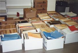 Photograph of boxes of files and binders