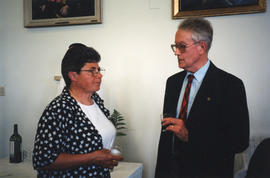 Photograph of Sylvia Fullerton and an unidentified man at Patricia Lutley's retirement party