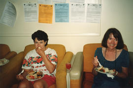 Photograph of Kellie Hawley and Donna Kenney at a group baby shower held in the staff room in the...