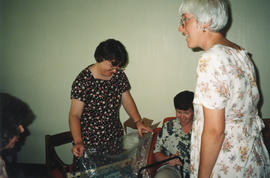 Photograph of Janice Slauenwhite, Kelly Casey and Bonnie Best Flemming at a group baby shower hel...