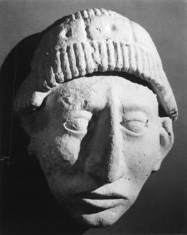 Photograph of stone carving of face