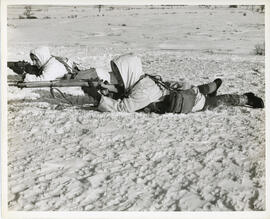 Photograph of two unidentified soldiers engaging in winter infantry training at Debert