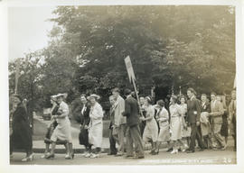 Photograph of a procession at an alumni reunion