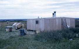 Photograph of a small wooden house in northern Quebec