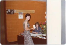 Photograph of Bonnie Best Flemming and Sandy Horricks in an office at the Killam Memorial Library