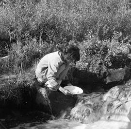 Photograph of Jeannie panning for gold in the Yukon