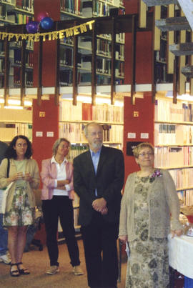 Photograph of four Kellogg Library staff at Betty Sutherland's retirement party
