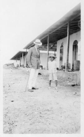 Dr. Walsh and a leper boy from the Leper Colony