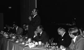 Photograph of a speaker at a law ring presentation