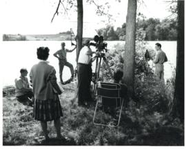 Photograph of camera and film crew preparing a scene on the bank of the Medway River