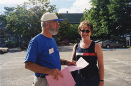 Photograph of Bill Maes, Chief Librarian, and an unidentified woman at the Killam Web Café