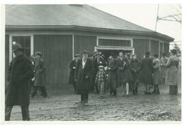 Photograph of Melville Cumming and others in winter in front of the Nova Scotia Agricultural Coll...