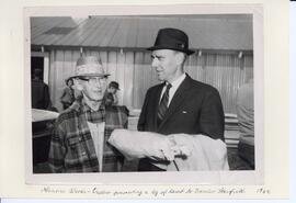 Photograph of Maurice Woods presenting leg of lamb to Premier Stanfield