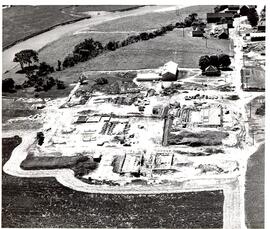 Photograph of an aerial view of the construction of a new barn complex at the Nova Scotia Agricul...