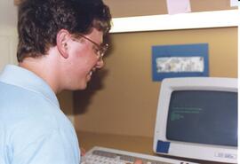 Photograph of library staff member Darren Blade at the 1987 Nova Scotia Agricultural College Open...