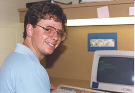 Photograph of library staff member Darren Blade at the 1987 Nova Scotia Agricultural College Open...