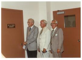 Photograph of Dr. MacRae, Dr. A.E. Roland, and another person at the official opening of the A.E....