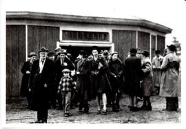 Reproduction of a photograph of Melville and others in winter in front of the Nova Scotia Agricul...