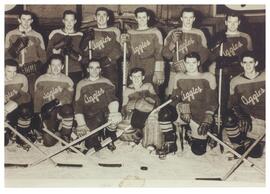 Photograph of the Nova Scotia Agricultural College hockey team, Aggies, on the ice