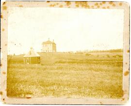 Photograph of the original building on the property of the Provincial Farm/School of Agriculture