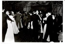 Photograph of students, young men and women, dancing in formal wear at the Nova Scotia Agricultur...